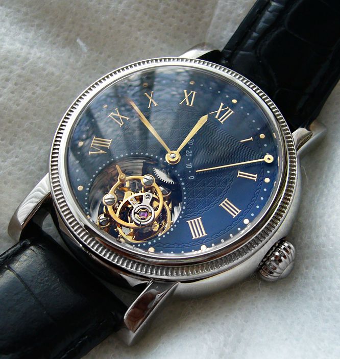 PLEASE NOTE THE WATCH HAS A STEEL CASE with GOLD MARKERS and 