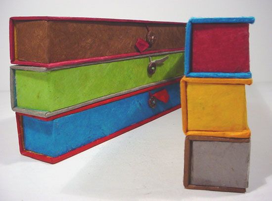 tibetan incense in handmade paper box filled with incense sticks