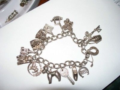 London Vintage Sterling Silver Charm Bracelet 15 Charms 48.2gr. Nuvo 