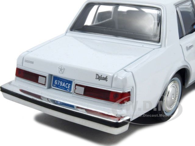 1986 DODGE DIPLOMAT WHITE 124 DIECAST MODEL CAR  