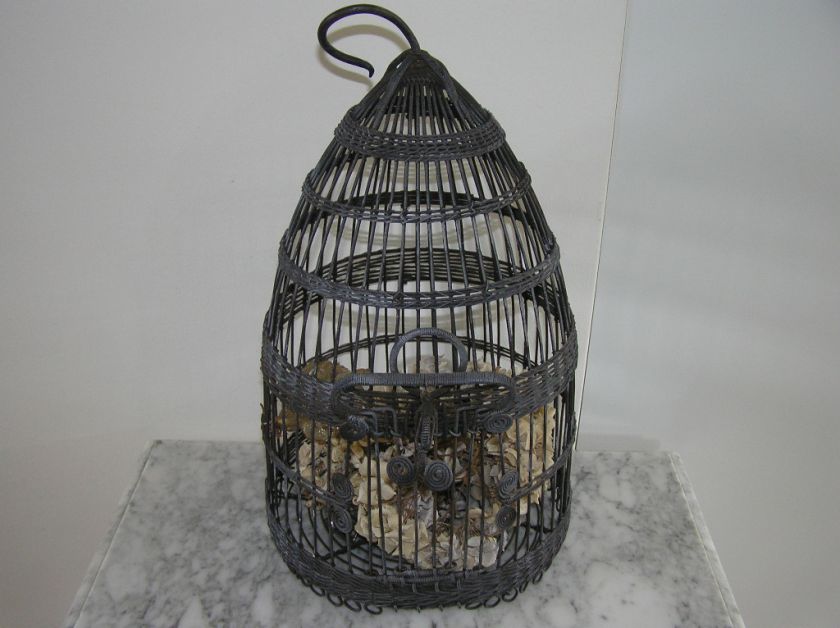 VINTAGE BIRD CAGE MADE FROM IRON WIRE.  